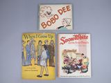 three children ' s books are lined up on a wall