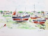 two boats that are sitting in the water