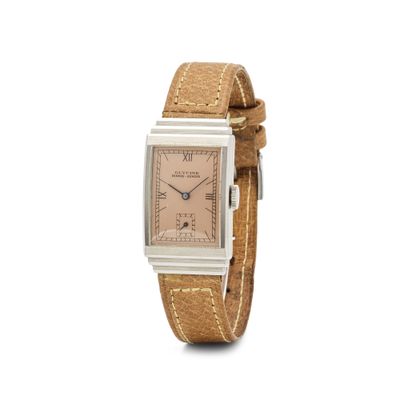 l'image d'une montre-bracelet avec un bracelet en cuir marron