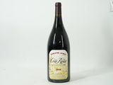 a bottle of wine that is sitting on a table