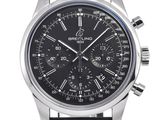 a close up of a watch with a black face and black leather strap