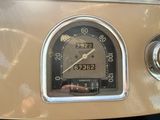 a close up of a speedometer on the dashboard of a car