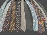 a bunch of ties that are tied together on a string