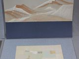 a picture of a picture of a mountain range in a box