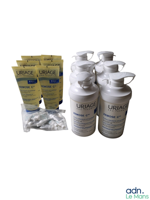 three bottles of uriage are sitting next to each other