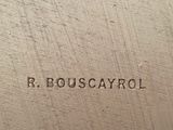 a close up of a book cover with the words r bouscayrol written on it