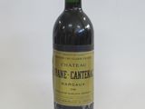 a bottle of wine that is sitting on a table