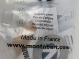a bag of toothbrushes and a toothpaste on a table