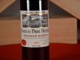 a bottle of wine that is sitting on a table
