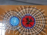 a picture of a tile with a picture of a clock on it