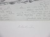 an old drawing of a dog laying down on the ground next to a piece of paper