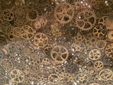 a large amount of gears on a metal surface