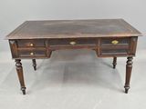 a wooden desk with two drawers and two drawers on each side