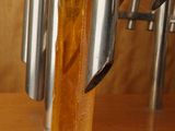 a wooden block with a knife on top of it