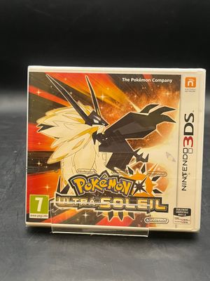 La boîte du jeu Pokémon Fireblade est posée sur une table.