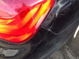 a close up of the tail light of a car