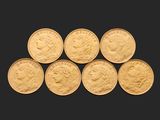 six souverains d'or britanniques sur fond noir