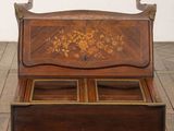 an image of a wooden box with a floral design on it