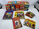 a lot of children ' s books that are on the table
