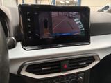 a picture of a car dashboard with a gps device in it