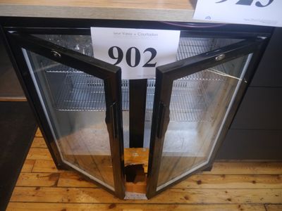a glass door that is open on a wooden floor