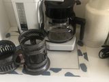 a coffee maker and other kitchen appliances on a counter