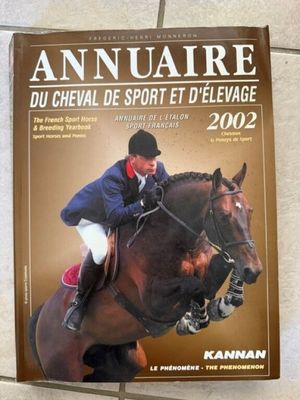 une image d'un magazine dont la couverture représente un cheval et un cavalier