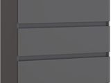 a gray chest of drawers with three drawers on each side