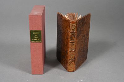 two books sitting next to each other on a table