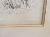 une photo d'un dessin représentant un chien, dans un cadre