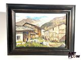 framed oil painting of a mountain village with a barn in the foreground