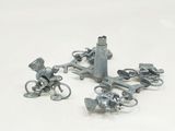 a group of metal objects that are on a white surface