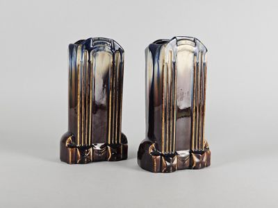 pair of art deco salt and pepper shakers on marble bases