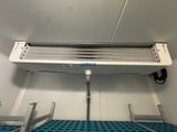 a white heater that is in a room