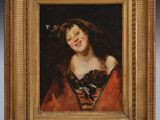 portrait d'une femme en robe rouge, avec une fleur dans les cheveux