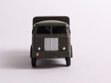a toy truck that is sitting on a white surface