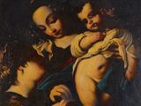 une image d'un tableau représentant une femme tenant un enfant dans ses bras