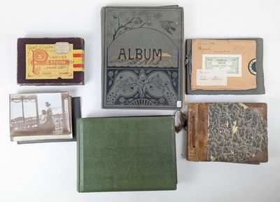 many different types of books on a white surface