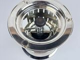 a silver plate with a black knob on top of it
