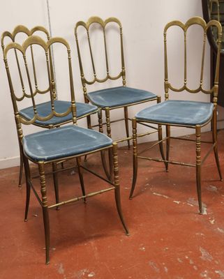 Suite de quatre chaises dans le gout "Chiavarina" en Laiton …