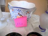 two bowls of food sitting on a table with a note on it