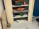 an image of a cluttered room with clutter and tools