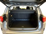 the back of a car with its trunk open showing the cargo compartment