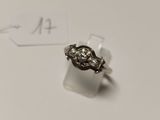 a ring that is sitting on top of a piece of paper