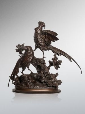 an image of a bronze sculpture of two birds on a tree stump