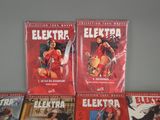 four books of elektra comics on a table