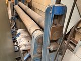 an image of a machine that is working on a piece of wood