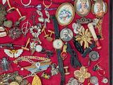 a picture of a picture of a collection of brooches