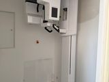 a room that has a white and black machine in it