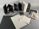 the contents of a photo album are laid out on the table